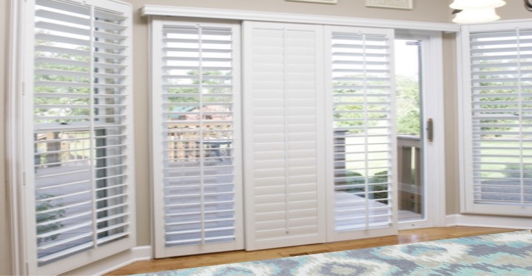 [Polywood|Plantation|Interior ]211] shutters on a sliding glass door in Fort Myers